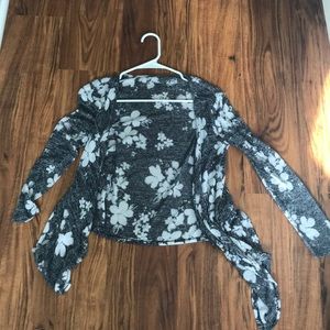 Justice: flower patterned; cardigan